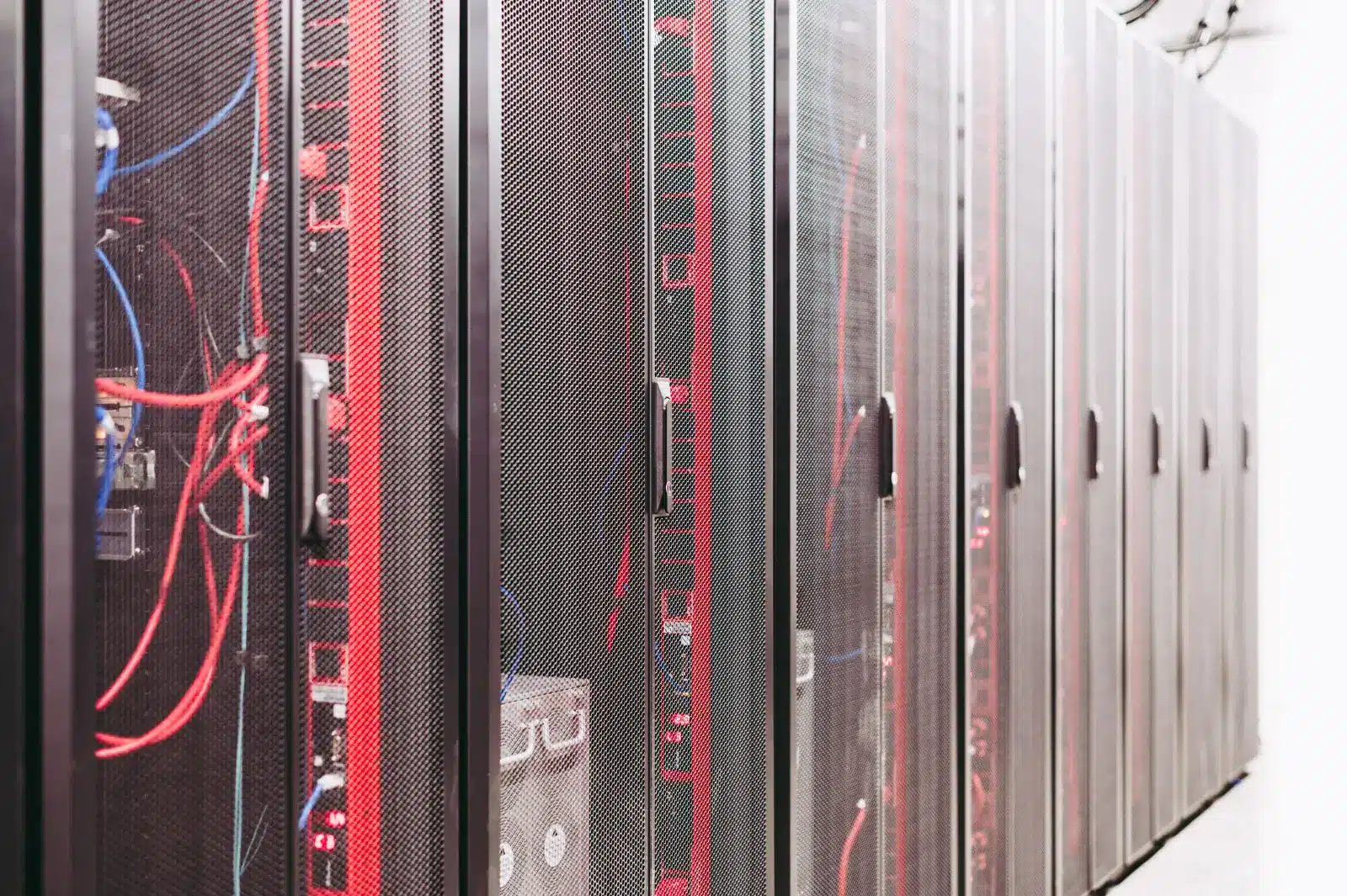 Server racks and network cables in a modern data centre
